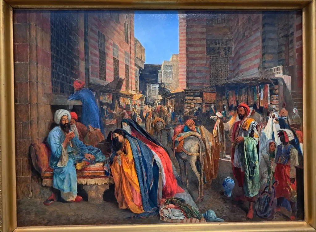 La-rue-et-la-Mosquée-Al-Ghouri-au-Caire-1870